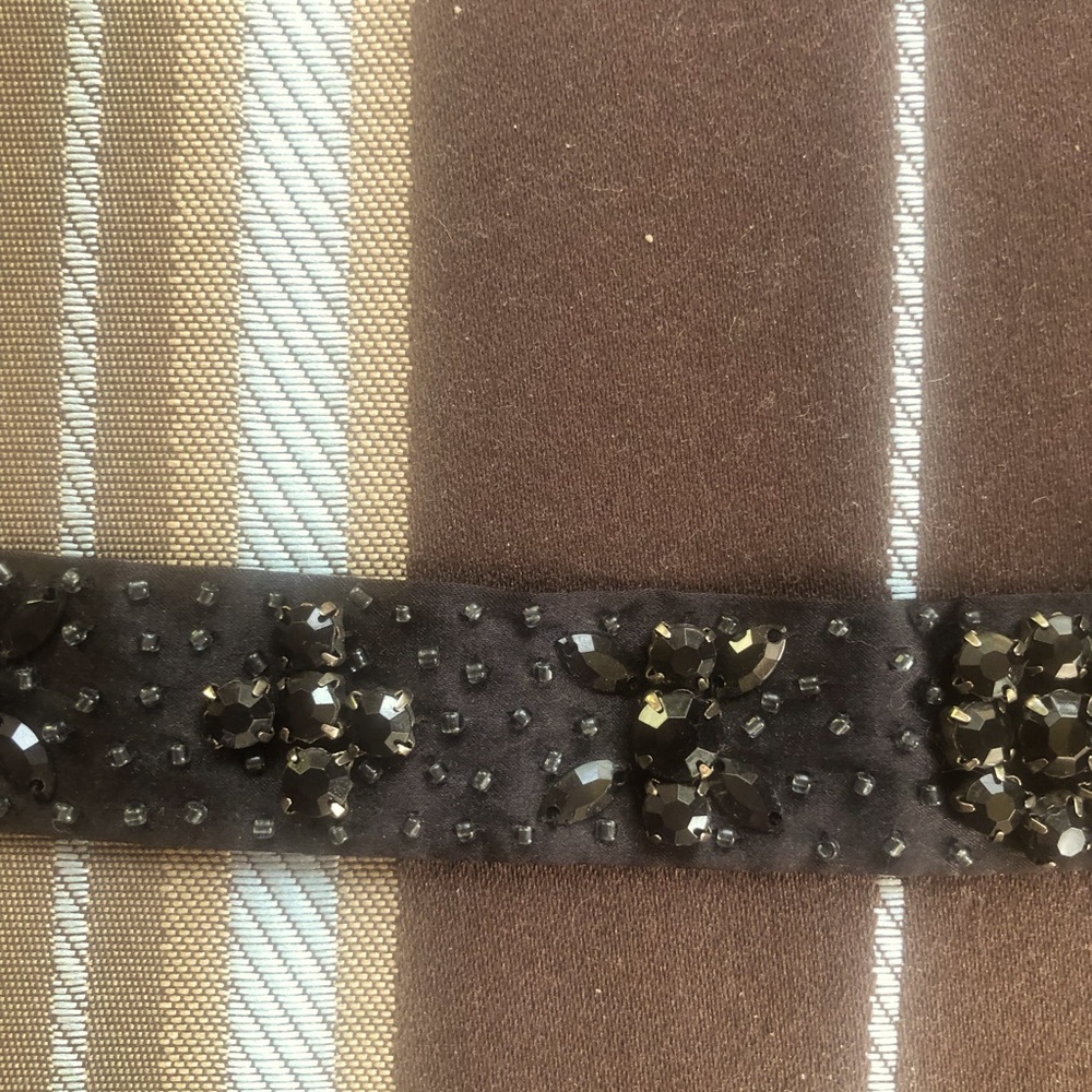 Unique 72 inch satin belt with embellishments.